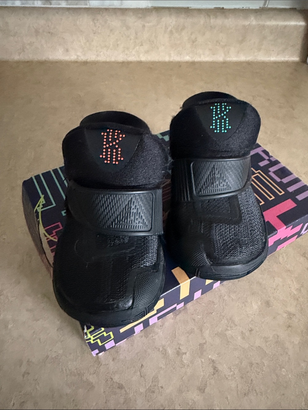 Nike Kids Black Sneakers with Green & Orange Logo Dots